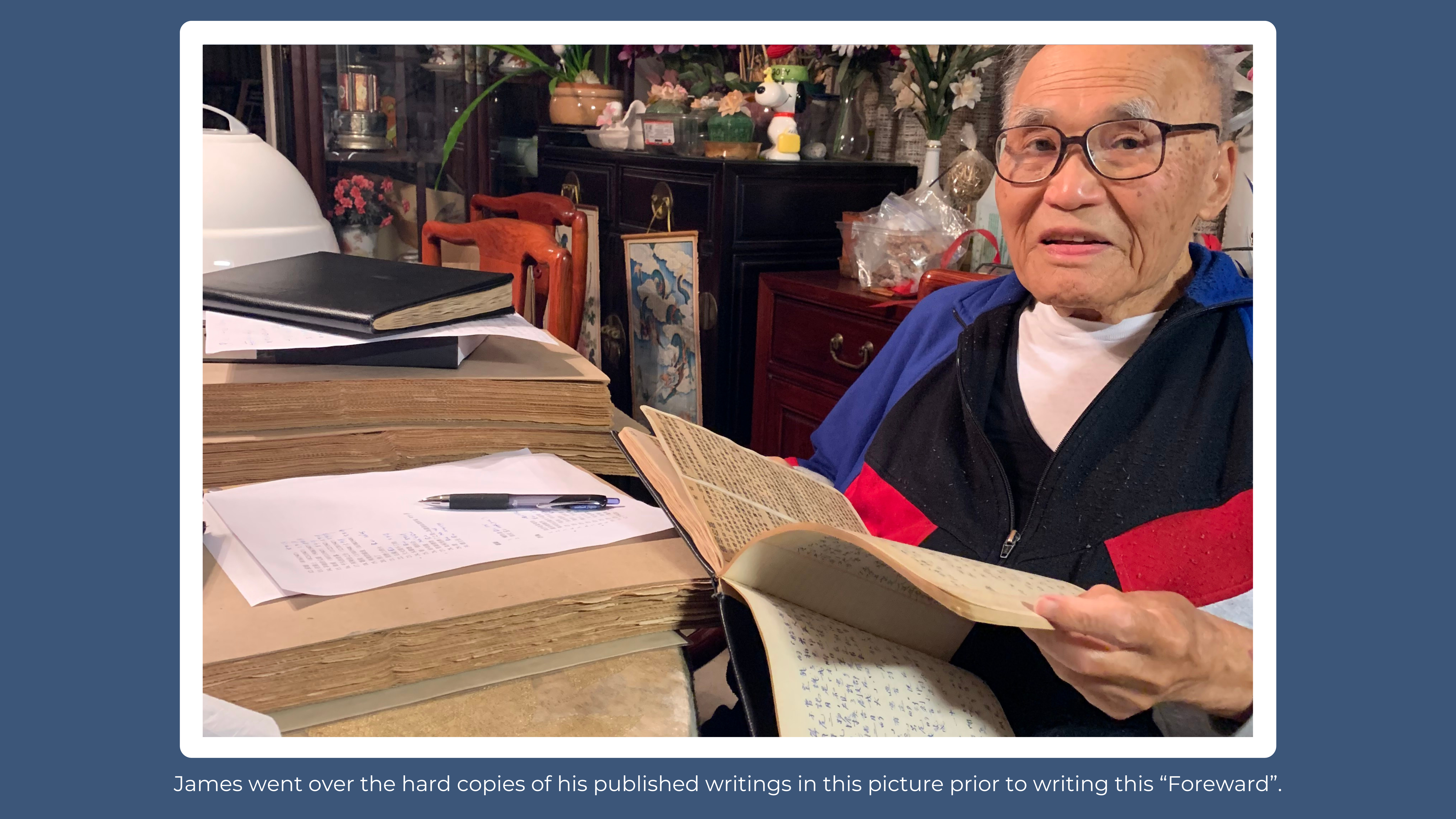 James reviewing publications at home